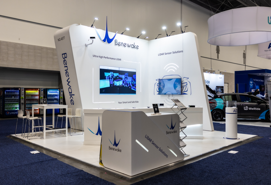 Benewake booth at CES 2023 displaying LiDAR sensor solutions and a vehicle demonstration