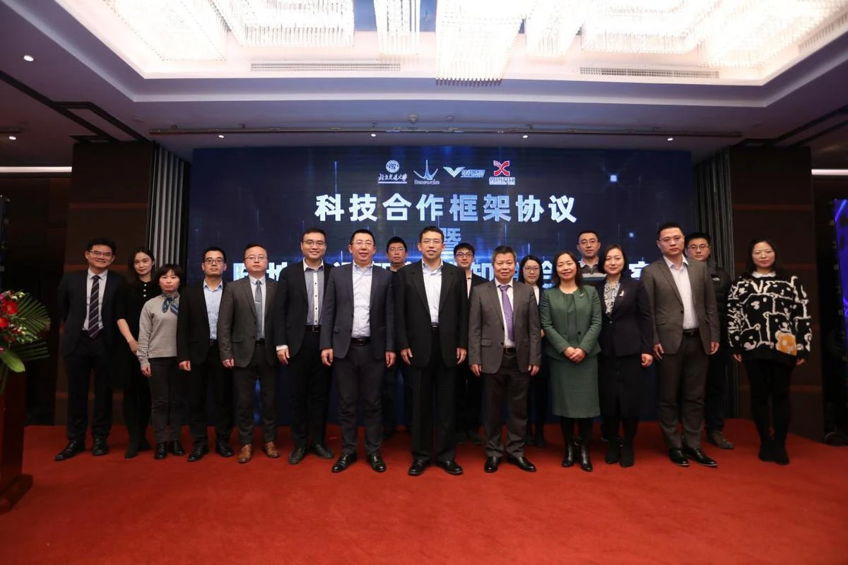 Representatives of Benewake and Beijing Jiaotong University pose after signing a framework agreement